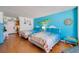 Comfortable bedroom offering two beds and unique coastal decor at 313 S Atlantic Ave # 6140, Daytona Beach, FL 32118