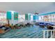 Bright lobby area featuring comfortable seating, stylish decor, and ample natural light at 313 S Atlantic Ave # 6140, Daytona Beach, FL 32118