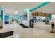 Hotel hallway with ATM, reception counter, seating, and access to guest rooms at 313 S Atlantic Ave # 6140, Daytona Beach, FL 32118