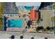 Top down aerial view of the large beachside pool and tiki bar and parking at 313 S Atlantic Ave # 6140, Daytona Beach, FL 32118