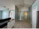 Light-filled dining area featuring tile flooring and a modern pendant light fixture at 3154 Red Berry Ct, Deltona, FL 32725