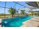 Inviting screened-in pool with lush landscaping and beautiful golf course and pond views at 3432 Wise Way, The Villages, FL 32163