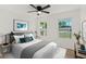 Bright bedroom features modern decor and comfortable bedding with ample natural light at 3813 Long Grove Ln, Port Orange, FL 32129