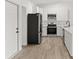Updated kitchen featuring stainless steel appliances, white cabinets, and modern countertops at 3813 Long Grove Ln, Port Orange, FL 32129