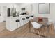 Stylish eat-in kitchen features a breakfast bar with seating for casual dining at 3813 Long Grove Ln, Port Orange, FL 32129
