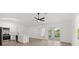 Bright open kitchen with stainless steel appliances and a sliding glass door to the backyard at 3813 Long Grove Ln, Port Orange, FL 32129