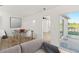 The living area showcases an open floor plan and sliding doors to the outdoor space at 3813 Long Grove Ln, Port Orange, FL 32129