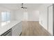 Spacious living area with modern kitchen with stainless steel appliances, and sliding glass doors at 3813 Long Grove Ln, Port Orange, FL 32129