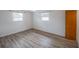 Bedroom featuring wood-look flooring and a window that brings in plenty of natural light at 412 Cherry St, South Daytona, FL 32119