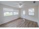 Comfortable bonus room with new flooring, ample natural light, and access to the backyard at 412 Cherry St, South Daytona, FL 32119
