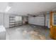 Spacious garage with shelving, automatic door, and plenty of room for storage and vehicles at 412 Cherry St, South Daytona, FL 32119