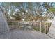 Outdoor balcony offers a cozy spot with a table and chairs for enjoying the views and fresh air at 4150 S Atlantic Ave # 104 B, New Smyrna Beach, FL 32169