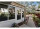 Welcoming home entrance with a decorative flower pots and a clear view of the door at 4150 S Atlantic Ave # 104 B, New Smyrna Beach, FL 32169