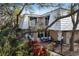 Charming home with a patio, balcony, and lush landscaping at 4150 S Atlantic Ave # 104 B, New Smyrna Beach, FL 32169