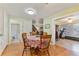 Inviting kitchen nook adjacent to the living room at 4150 S Atlantic Ave # 104 B, New Smyrna Beach, FL 32169