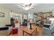 Spacious living room leading to the kitchen and sunroom at 4150 S Atlantic Ave # 104 B, New Smyrna Beach, FL 32169