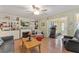 Inviting living room with a fireplace and built-in shelving at 4150 S Atlantic Ave # 104 B, New Smyrna Beach, FL 32169