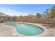 Backyard pool with a serene setting featuring a hammock, perfect for enjoying sunny days at 445 Virginia Ave, St Cloud, FL 34769