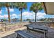 Outdoor patio with lovely views of the water and surrounding properties at 503 N Causeway # 7020, New Smyrna Beach, FL 32169