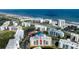 Aerial view showcasing the building's proximity to the beach, ocean and amenities at 5300 S Atlantic Ave # 8-404, New Smyrna Beach, FL 32169