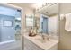 Bathroom featuring a vanity with sink, mirror, and decorative decor at 5300 S Atlantic Ave # 8-404, New Smyrna Beach, FL 32169