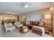 Cozy living room with hardwood floors, open to dining area, and well-lit with natural lighting at 5300 S Atlantic Ave # 8-404, New Smyrna Beach, FL 32169