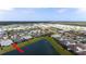 Extensive aerial view of the residential area, community ponds, and neighboring properties at 583 Lost Shaker Way, Daytona Beach, FL 32124