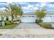 Charming single-story home with paver driveway and two-car garage at 583 Lost Shaker Way, Daytona Beach, FL 32124