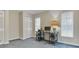 Bedroom with a workspace area, a computer, and neutral walls and carpet at 5981 Jandon Ct, Port Orange, FL 32127