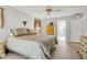 Comfortable bedroom features neutral walls, wood floors, and a large closet at 5981 Jandon Ct, Port Orange, FL 32127