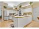 Well-lit kitchen features modern appliances and hardwood floors at 5981 Jandon Ct, Port Orange, FL 32127