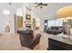 Cozy living room with a fireplace, hardwood floors, and comfortable seating at 5981 Jandon Ct, Port Orange, FL 32127