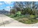 Community playground area with modern play equipment, safety turf, and shade trees at 6058 Central Park Blvd, Port Orange, FL 32127