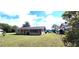 Spacious backyard offering ample green space for outdoor activities and relaxation at 685 E French Ave, Orange City, FL 32763