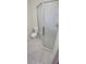 Bathroom with a walk-in shower and standard toilet at 685 E French Ave, Orange City, FL 32763