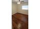 Bedroom with hardwood floors, neutral walls, and a window at 685 E French Ave, Orange City, FL 32763