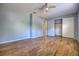 Bedroom with ample closet space and a ceiling fan; blue painted walls at 741 Greenway Pl, Daytona Beach, FL 32114