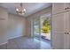 Dining area with sliding glass doors to patio and built-in cabinetry for extra storage at 741 Greenway Pl, Daytona Beach, FL 32114