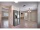 Bright dining area featuring stainless steel appliances and ample cabinet space at 741 Greenway Pl, Daytona Beach, FL 32114