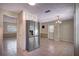 Eat-in kitchen featuring stainless steel appliances, tile flooring, and ample cabinet space at 741 Greenway Pl, Daytona Beach, FL 32114