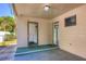 Covered patio area with access to storage and backyard at 741 Greenway Pl, Daytona Beach, FL 32114