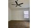 Bedroom featuring neutral walls, cozy carpet, ceiling fan, and natural light at 7879 Camlyn Ct, Orlando, FL 32818