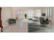 Bright living room is virtually staged with contemporary furniture and decor at 826 W Gaucho Cir, Deltona, FL 32725