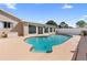 Inviting in-ground pool surrounded by a spacious patio and home exterior at 826 W Gaucho Cir, Deltona, FL 32725