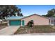 This home features an attached garage, a quaint backyard, and convenient access at 980 Buttercup Ter, Deltona, FL 32725