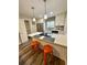 Bright and stylish kitchen featuring stainless steel appliances, ample counter space and modern fixtures at 1000 Lake Of The Woods Blvd # 104F, Casselberry, FL 32730