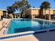 Image shows the property's inviting swimming pool for residents' relaxation and recreation at 1000 Lake Of The Woods Blvd # 104F, Casselberry, FL 32730