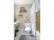 Cozy bathroom featuring a bathtub, toilet, and decor at 10477 Montpelier Cir, Orlando, FL 32821