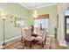 Light and airy dining room featuring a chandelier and large windows at 1051 Dunbar Ave, Sanford, FL 32771