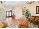 Grand foyer with tile flooring, decorative rug, and beautiful front doors at 1051 Dunbar Ave, Sanford, FL 32771